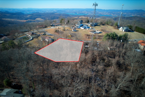 Aerial view of a hilltop 0.5-acre parcel outlined in Hamblen County, Tennessee